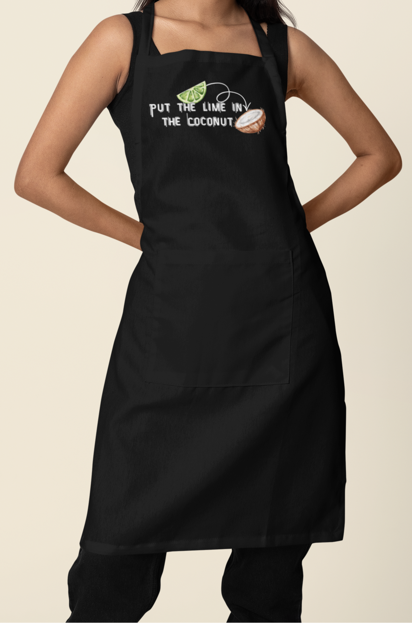 Woman wearing a black apron with a logo on a beige background