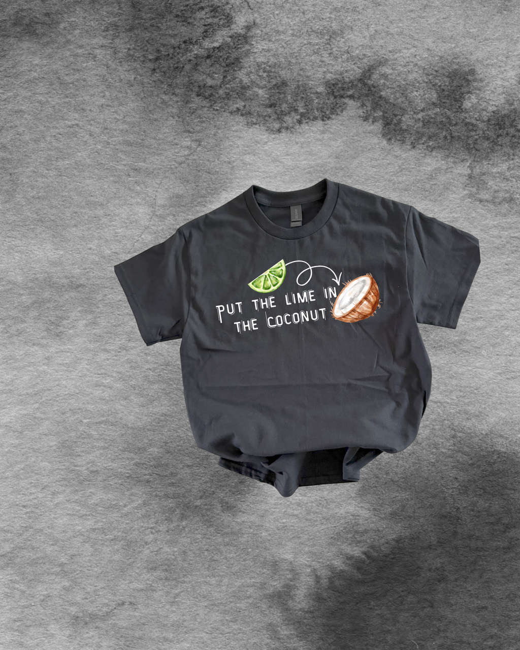 Black t-shirt with a graphic design on a gray textured background